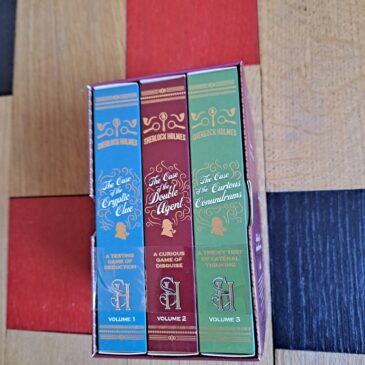 Sherlock Holmes The Challenge Trilogy books in a presentation box
